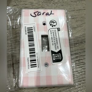 Pink gingham light switch cover